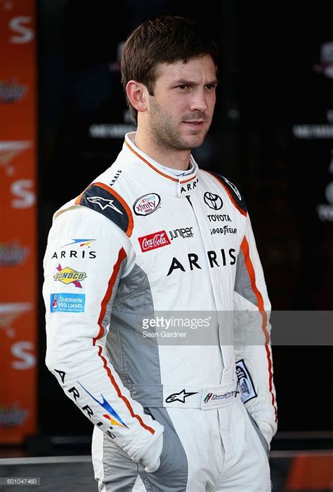 Do you like that in terms of maximizing your chances of winning or do you like keeping everything the same because it is a team sport, you have to keep the team you're with? Daniel Suarez, driver of the ARRIS Toyota, stands in the ...