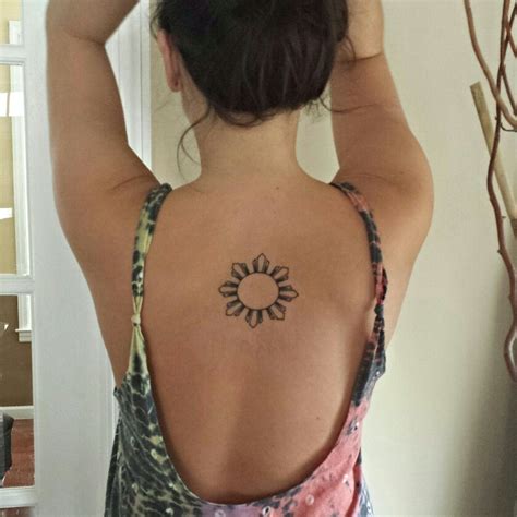 This minimal design includes just an outline of the sun and surrounding stars. 10 Inspiring Philippine Tattoos That Will Make You Want One