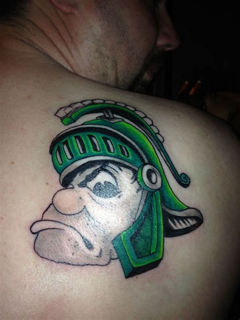 He is passionate about keeping the shop a clean, well oiled machine, that turns out stellar work for residents of the holt / lansing area and those who travel even further to get tattooed here. Husband's Sparty tattoo. Done by The Tattoo Shop in ...