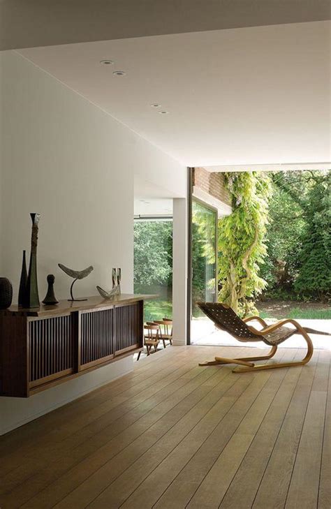 Aalto began designing furnishings as a natural extension of his architectural thinking. Lounge Chair 43 in Birch and Black by Alvar Aalto and ...