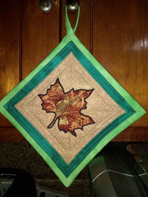 Patterns preceded by an asterisk (*) are in pdf format. Pot holder using an accuquilt leaf embroidery pattern ...