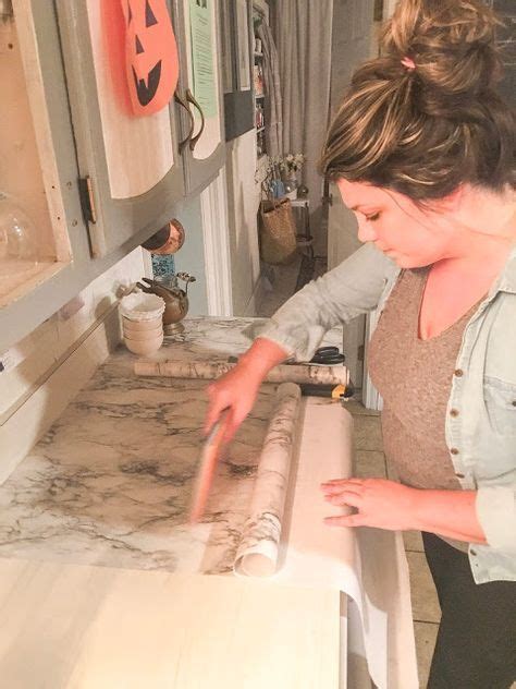 This great video provided by home depot demonstrates the right way to install tile for your kitchen countertop with a sink. SavannaBrooke.com: DIY Countertops with Contact Paper ...