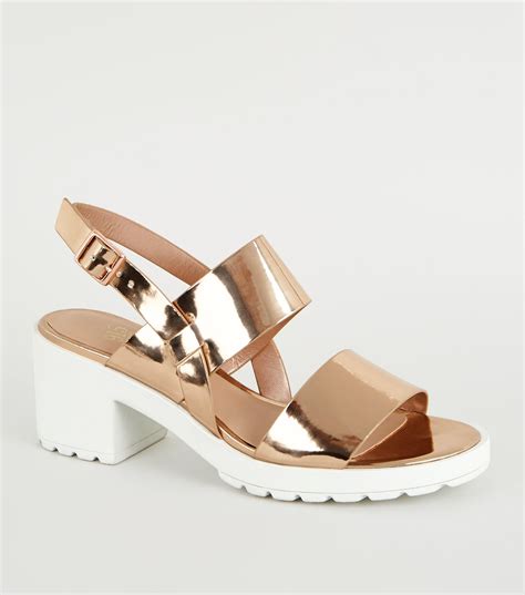 Wear them with something short to really elongate your legs! New Look Girls Rose Gold Chunky Heel Sandals - Lyst