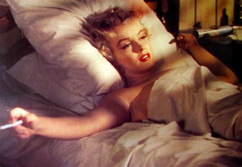 Marilyn monroe decorative posters & prints. Film Noir Photos: Smoking in Bed: Marilyn Monroe