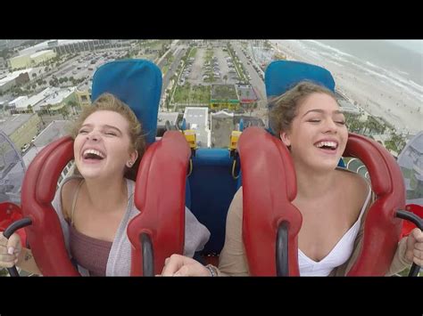 Slingshot thrill ride on daytona beach boardwalk propelling riders more than 360 ft. Riley and Madison
